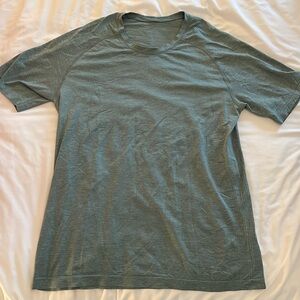 Men’s green/grey Lululemon shirt. Size Large.
